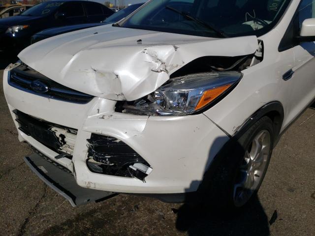 Photo 9 from auction – 2016 FORD ESCAPE TIT with VIN 1FMCU0J97GUA94827
