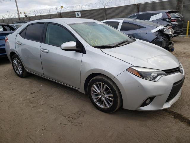 TOYOTA COROLLA L 2014 with VIN 5YFBURHE0EP003754 - Photo from auction