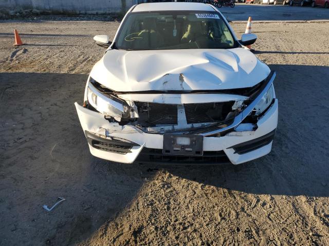Photo 9 from auction – 2016 HONDA CIVIC LX with VIN 19XFC2F57GE041730