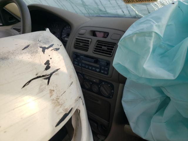 Photo 9 from auction – 2001 TOYOTA COROLLA CE with VIN 2T1BR12E81C405818