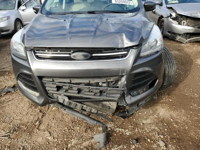 Photo 9 from auction – 2015 FORD ESCAPE TIT with VIN 1FMCU9J9XFUC57229