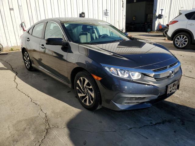 HONDA CIVIC EX 2018 with VIN 2HGFC2F7XJH509996 - Photo from auction