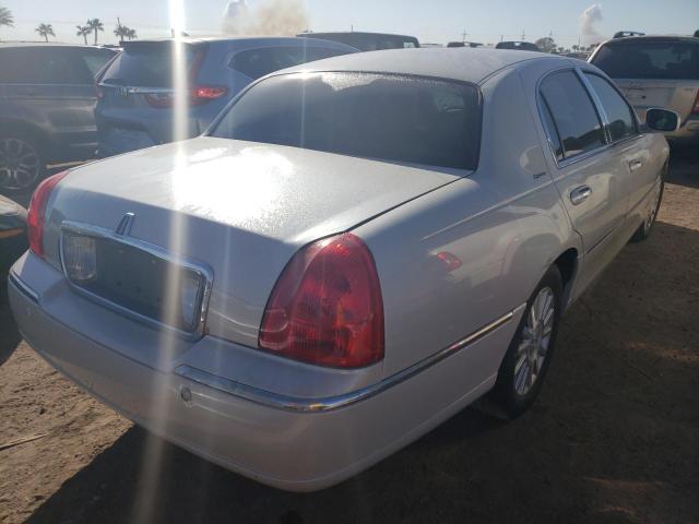 Photo 4 from auction – 2004 LINCOLN TOWN CAR E with VIN 1LNHM81W84Y640937