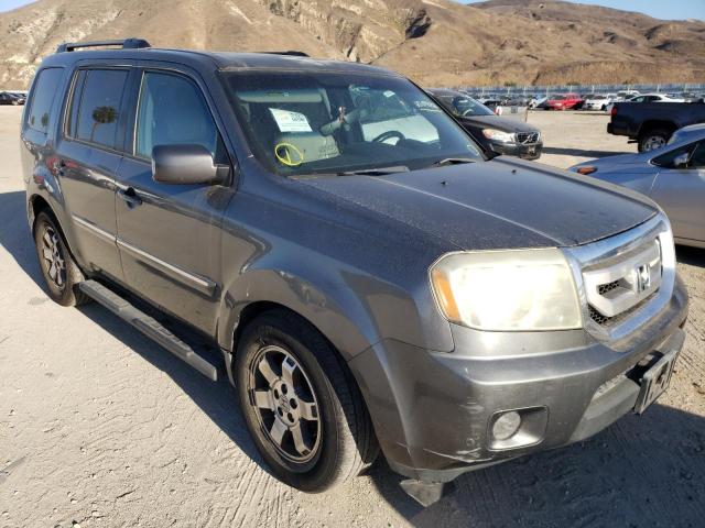 HONDA PILOT TOUR 2011 with VIN 5FNYF4H99BB033207 - Photo from auction