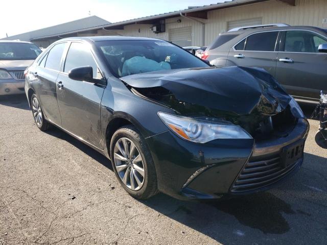 TOYOTA CAMRY LE 2017 with VIN 4T1BF1FK3HU776578 - Photo from auction