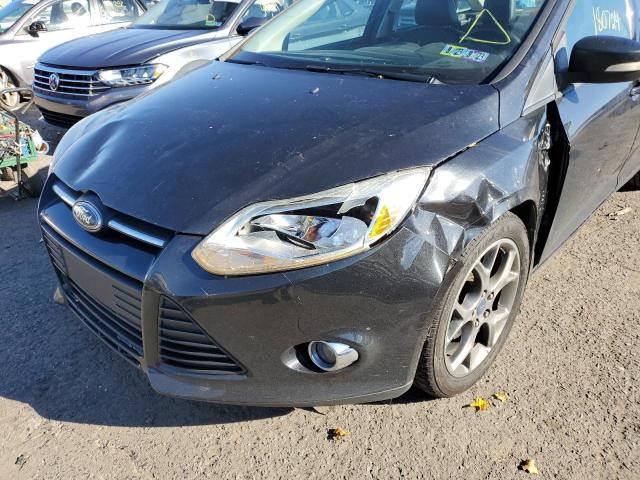 Photo 9 from auction – 2013 FORD FOCUS SE with VIN 1FADP3F24DL206942