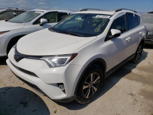 Photo 2 from auction – 2017 TOYOTA RAV4 XLE with VIN JTMWFREV2HJ128361