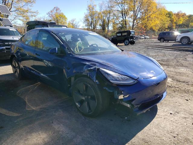 TESLA MODEL 3 2021 with VIN 5YJ3E1EB7MF858359 - Photo from auction
