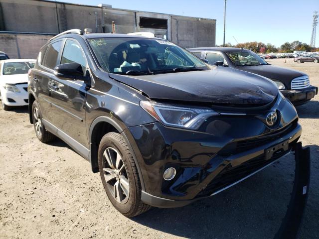 TOYOTA RAV4 XLE 2017 with VIN 2T3RFREV7HW670327 - Photo from auction