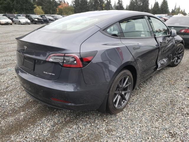 Photo 4 from auction – 2022 TESLA MODEL 3 with VIN 5YJ3E1EB1NF334870