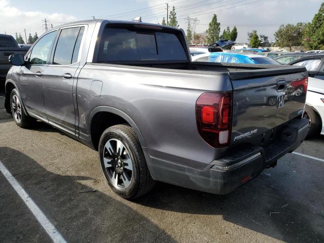 Photo 3 from auction – 2020 HONDA RIDGELINE with VIN 5FPYK3F58LB023458