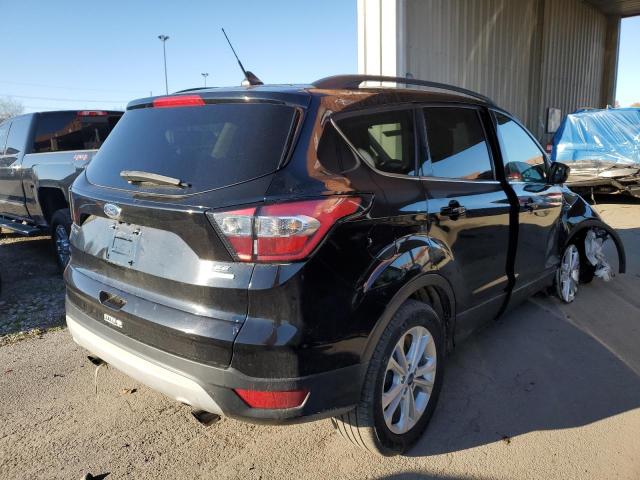 Photo 4 from auction – 2018 FORD ESCAPE SE with VIN 1FMCU0GD8JUC58654