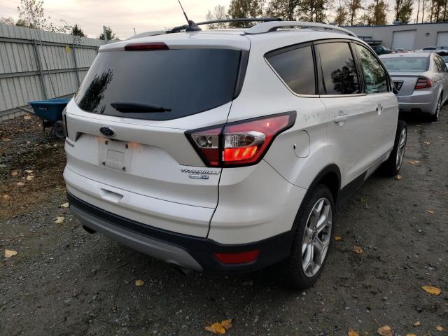 Photo 4 from auction – 2018 FORD ESCAPE TIT with VIN 1FMCU9J91JUC10079