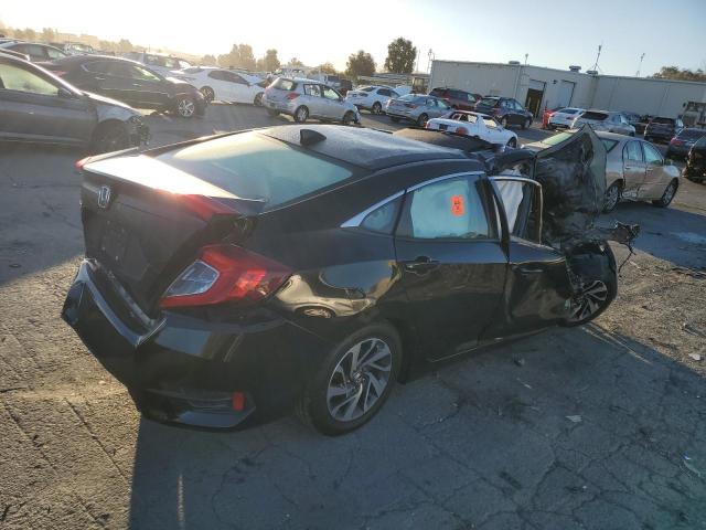 Photo 4 from auction – 2018 HONDA CIVIC EX with VIN 2HGFC2F70JH606205