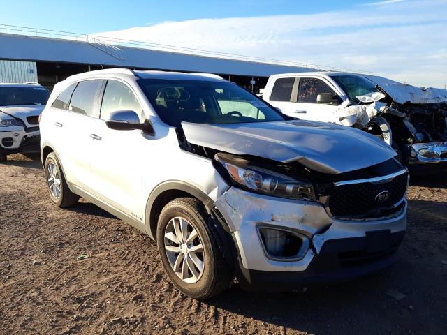 KIA SORENTO LX 2016 with VIN 5XYPGDA56GG102130 - Photo from auction