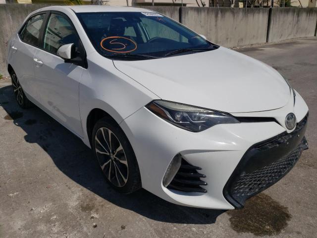 TOYOTA COROLLA L 2017 with VIN 5YFBURHE8HP675534 - Photo from auction