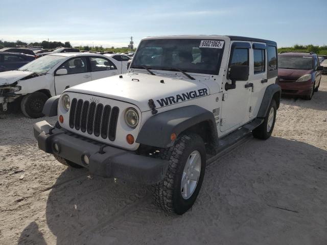 Photo 2 from auction – 2013 JEEP WRANGLER U with VIN 1C4BJWDG6DL658698