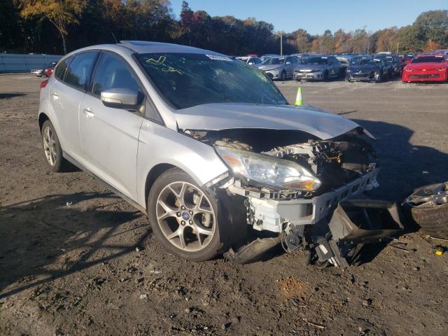 FORD FOCUS SE 2014 with VIN 1FADP3K23EL386969 - Photo from auction