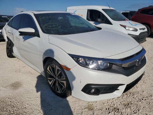 HONDA CIVIC EXL 2018 with VIN JHMFC1F74JX030458 - Photo from auction
