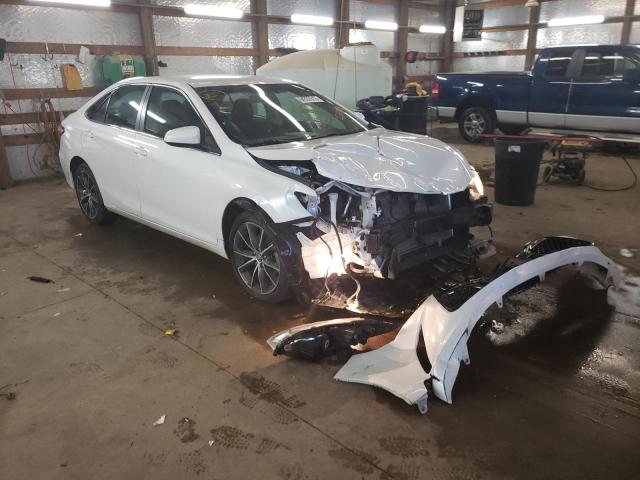 TOYOTA CAMRY LE 2017 with VIN 4T1BF1FK4HU289664 - Photo from auction