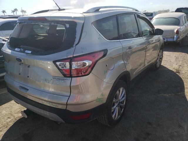Photo 4 from auction – 2017 FORD ESCAPE TIT with VIN 1FMCU0J91HUD35556