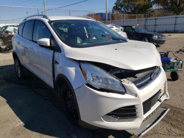 FORD ESCAPE TIT 2016 with VIN 1FMCU0J97GUA94827 - Photo from auction