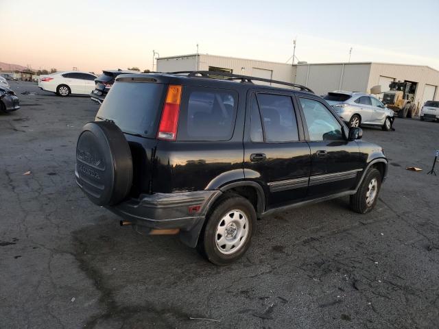 Photo 4 from auction – 2001 HONDA CR-V LX with VIN JHLRD28441S004124