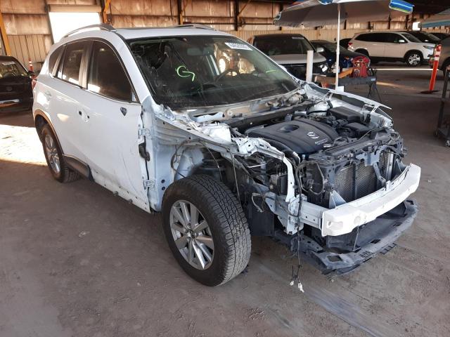 MAZDA CX-5 TOURI 2014 with VIN JM3KE4CY5E0389543 - Photo from auction