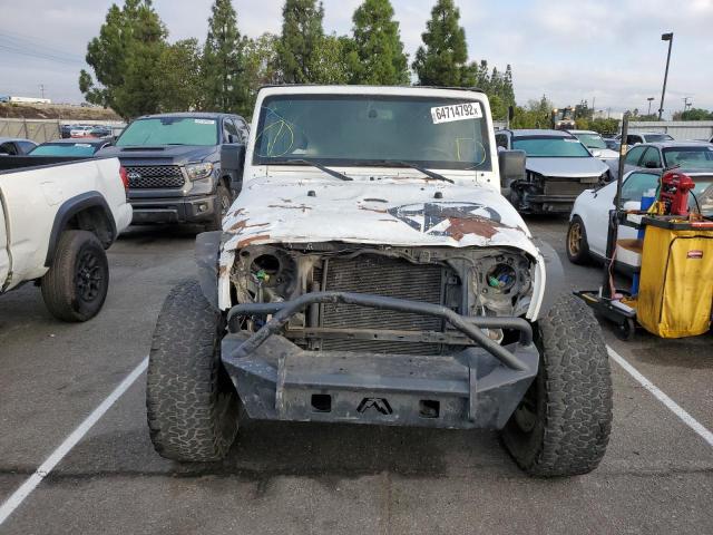 Photo 9 from auction – 2013 JEEP WRANGLER U with VIN 1C4BJWDGXDL597436