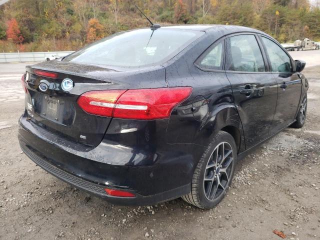 Photo 4 from auction – 2018 FORD FOCUS SE with VIN 1FADP3F22JL215649