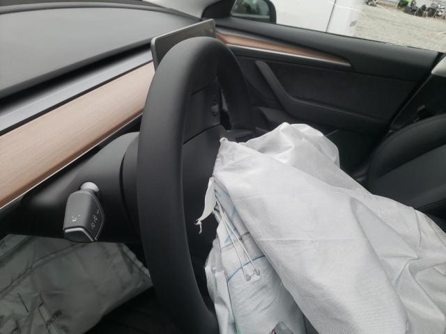 Photo 8 from auction – 2022 TESLA MODEL 3 with VIN 5YJ3E1EB1NF334870