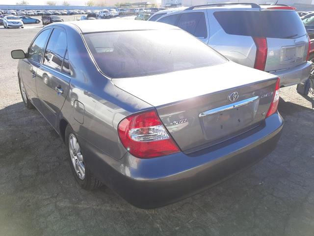 Photo 3 from auction – 2002 TOYOTA CAMRY LE with VIN JTDBF30K020036459