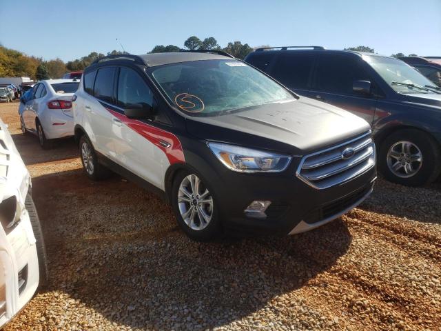 FORD ESCAPE SE 2018 with VIN 1FMCU0GD8JUD18691 - Photo from auction