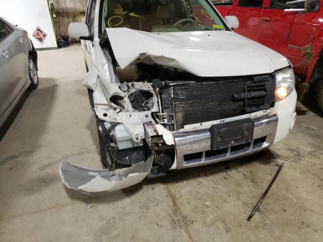 Photo 9 from auction – 2011 FORD ESCAPE LIM with VIN 1FMCU0EG5BKB77802