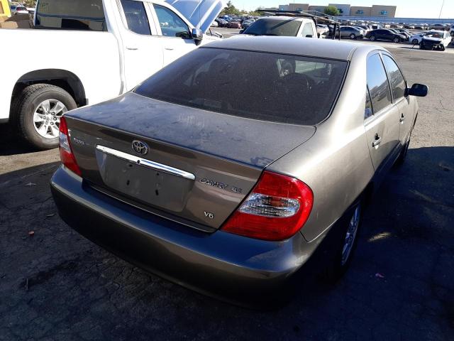 Photo 4 from auction – 2002 TOYOTA CAMRY LE with VIN JTDBF30K020036459