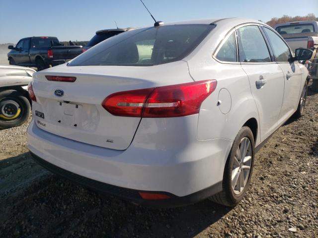 Photo 4 from auction – 2018 FORD FOCUS SE with VIN 1FADP3F22JL275348