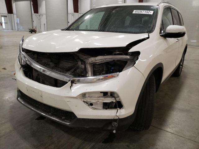 Photo 9 from auction – 2016 HONDA PILOT TOUR with VIN 5FNYF6H95GB040237