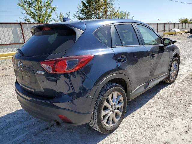 Photo 4 from auction – 2014 MAZDA CX-5 GT with VIN JM3KE2DY0E0421009