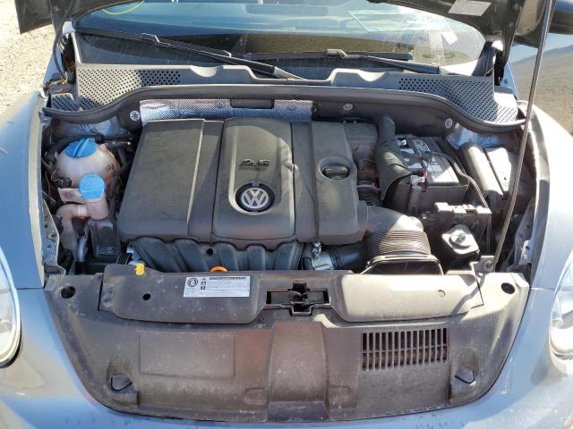Photo 7 from auction – 2014 VOLKSWAGEN BEETLE with VIN 3VWFP7AT3EM624738