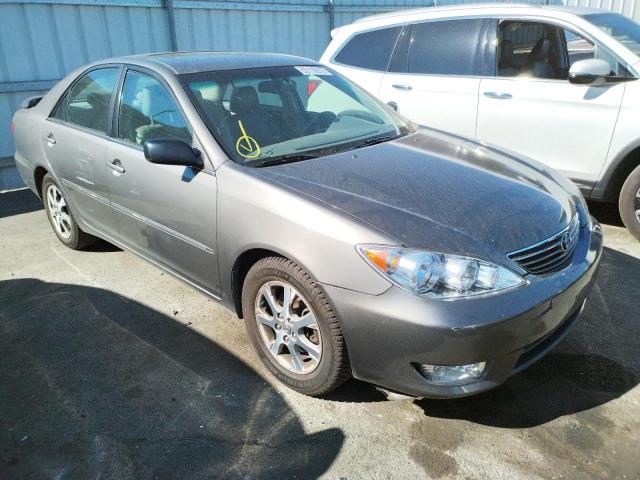 TOYOTA CAMRY LE 2005 with VIN 4T1BF32K75U596890 - Photo from auction