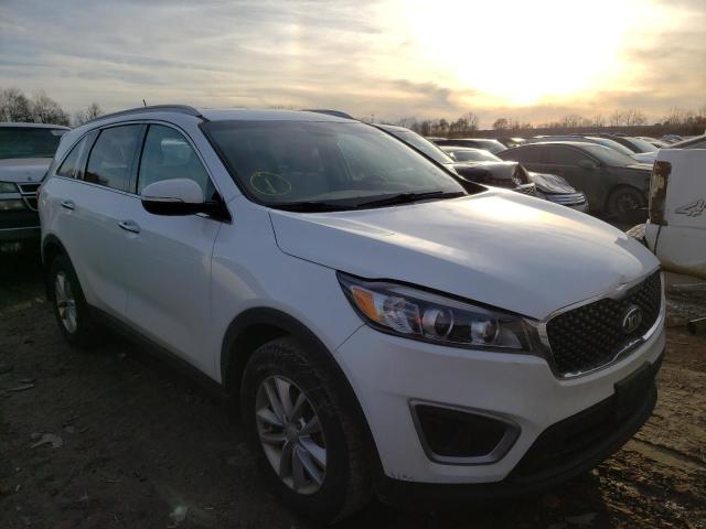 KIA SORENTO LX 2017 with VIN 5XYPG4A3XHG285385 - Photo from auction