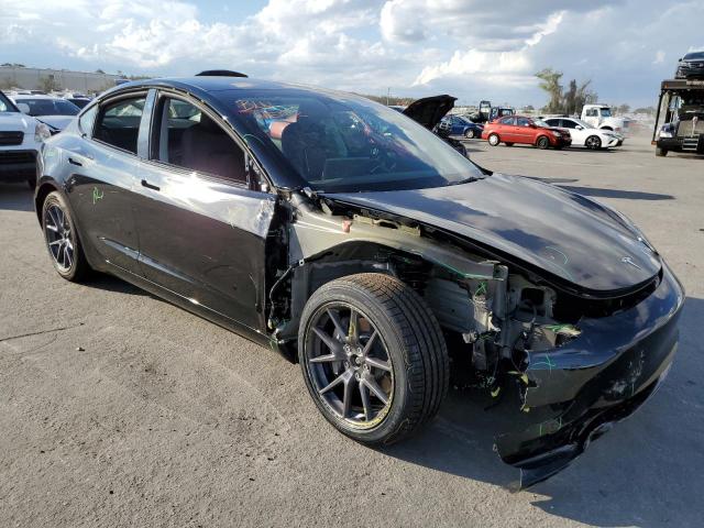 Photo 4 from auction – 2022 TESLA MODEL 3 with VIN 5YJ3E1EBXNF290402