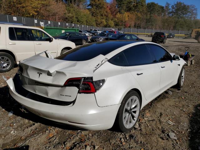 Photo 4 from auction – 2021 TESLA MODEL 3 with VIN 5YJ3E1EB9MF083806
