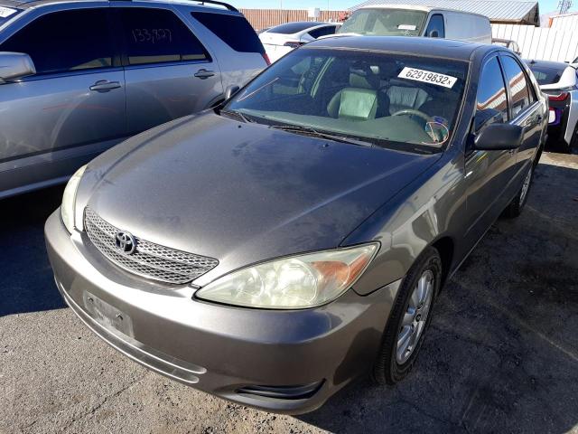 Photo 2 from auction – 2002 TOYOTA CAMRY LE with VIN JTDBF30K020036459