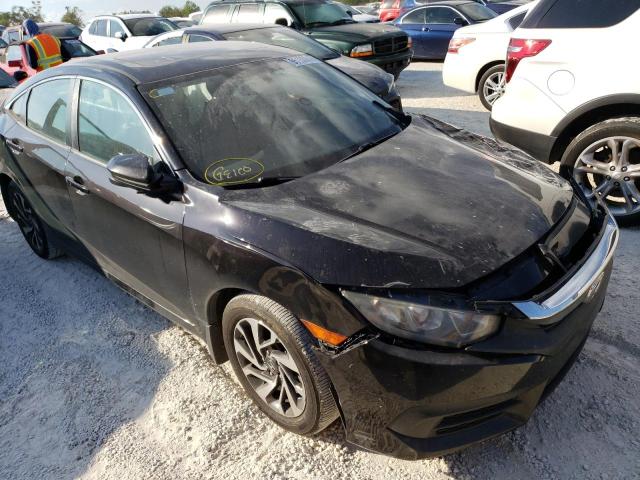 Photo 1 from auction – 2018 HONDA CIVIC EX with VIN 2HGFC2F74JH568459