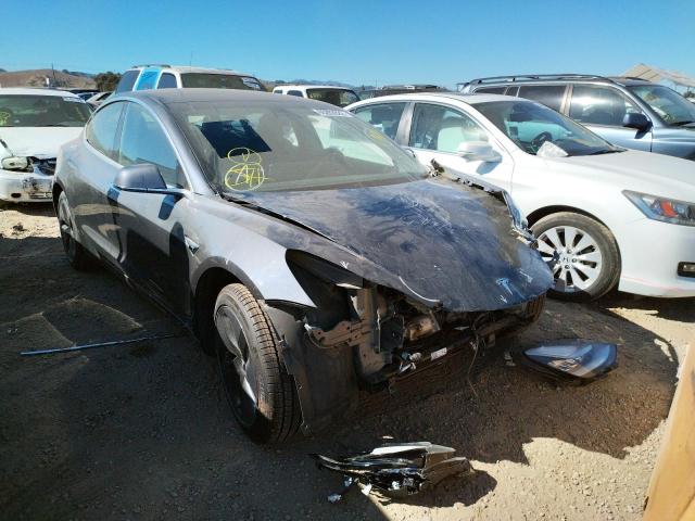TESLA MODEL 3 2018 with VIN 5YJ3E1EB3JF128301 - Photo from auction