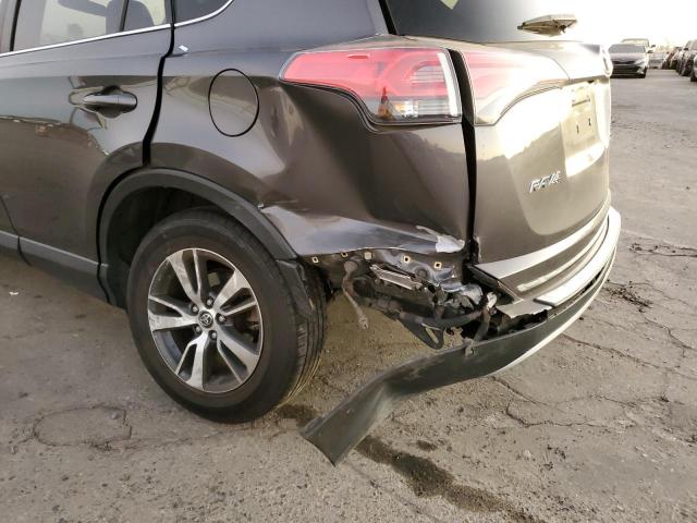 Photo 9 from auction – 2017 TOYOTA RAV4 XLE with VIN JTMWFREV4HJ145243