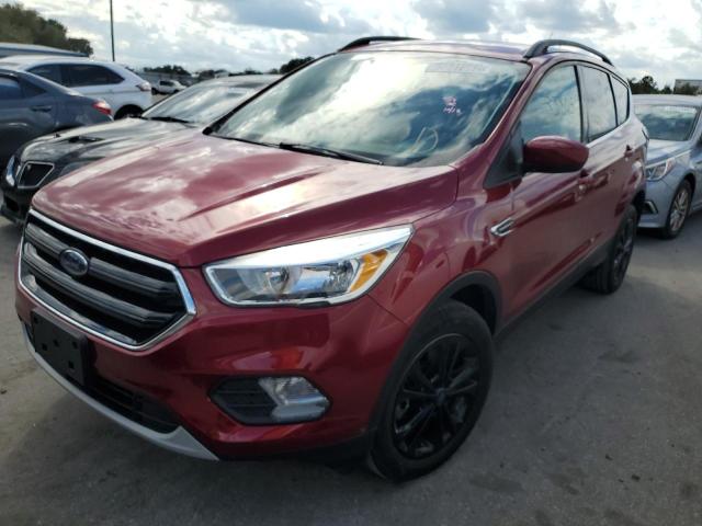 FORD ESCAPE SE 2018 with VIN 1FMCU9GD8JUA72004 - Photo from auction