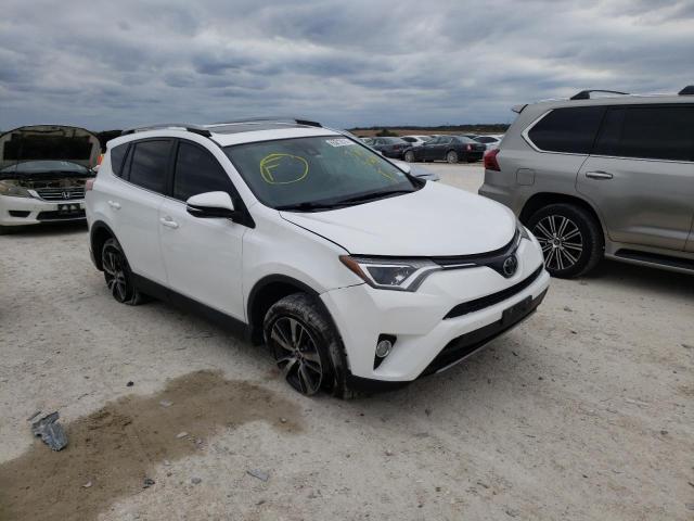 TOYOTA RAV4 XLE 2017 with VIN 2T3WFREV1HW389868 - Photo from auction