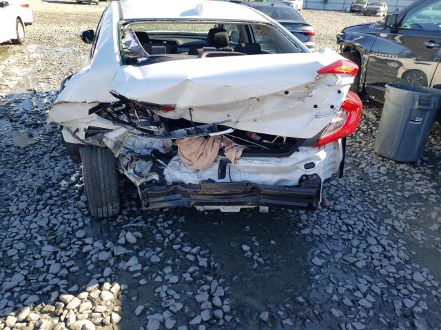 Photo 9 from auction – 2017 HONDA CIVIC EX with VIN 2HGFC2F70HH577704